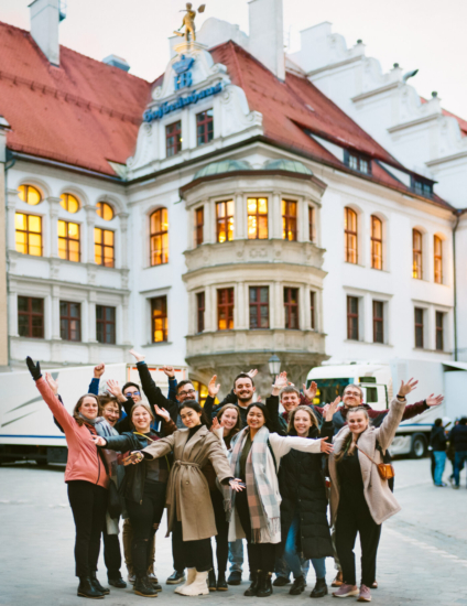 Group of students standing in a town square near Hofbraeuhaus